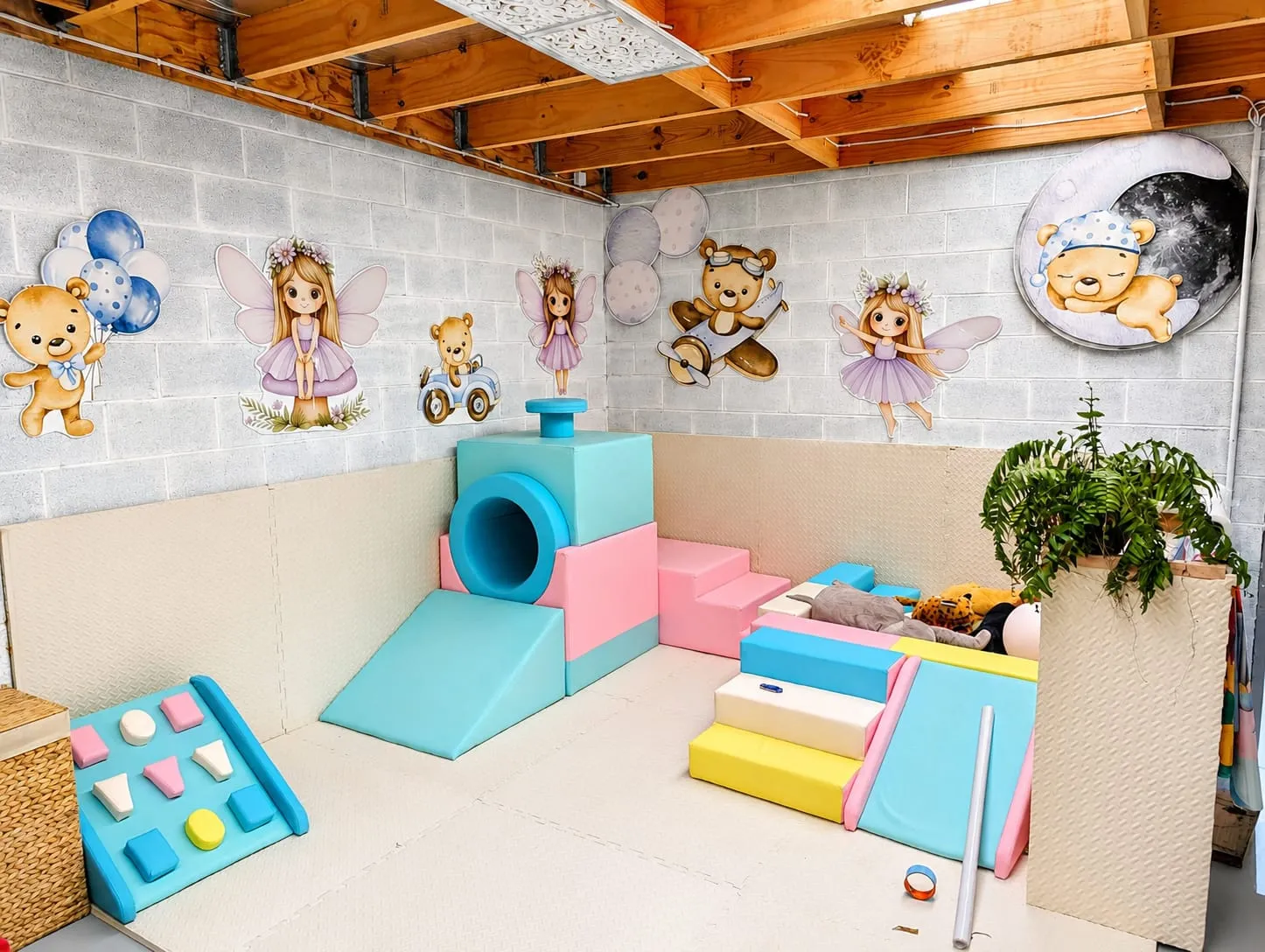 Soft Play Area — pastel foam climbing blocks, slide and steps on padded mats